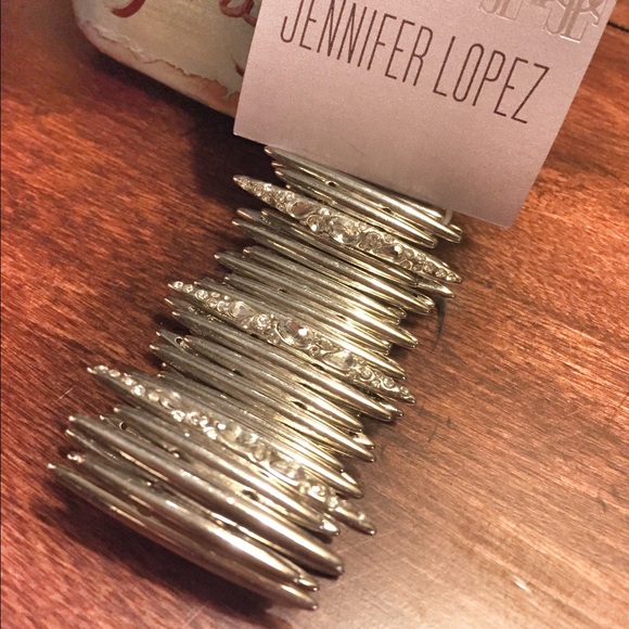 Evening silver bangle bracket with rhinestones