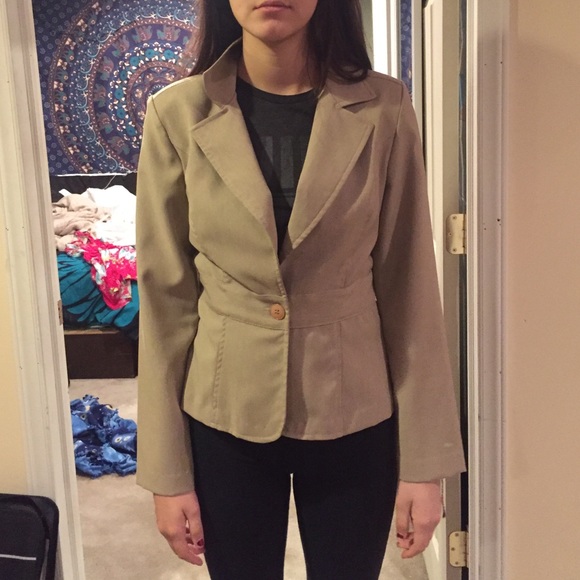 Tan woman's suit jacket