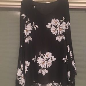 Floral dress with lace detail and bell sleeves