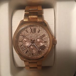 Gold fossil watch