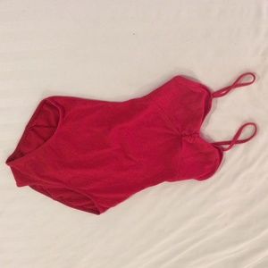Red one piece vintage looking swim suit, or top.