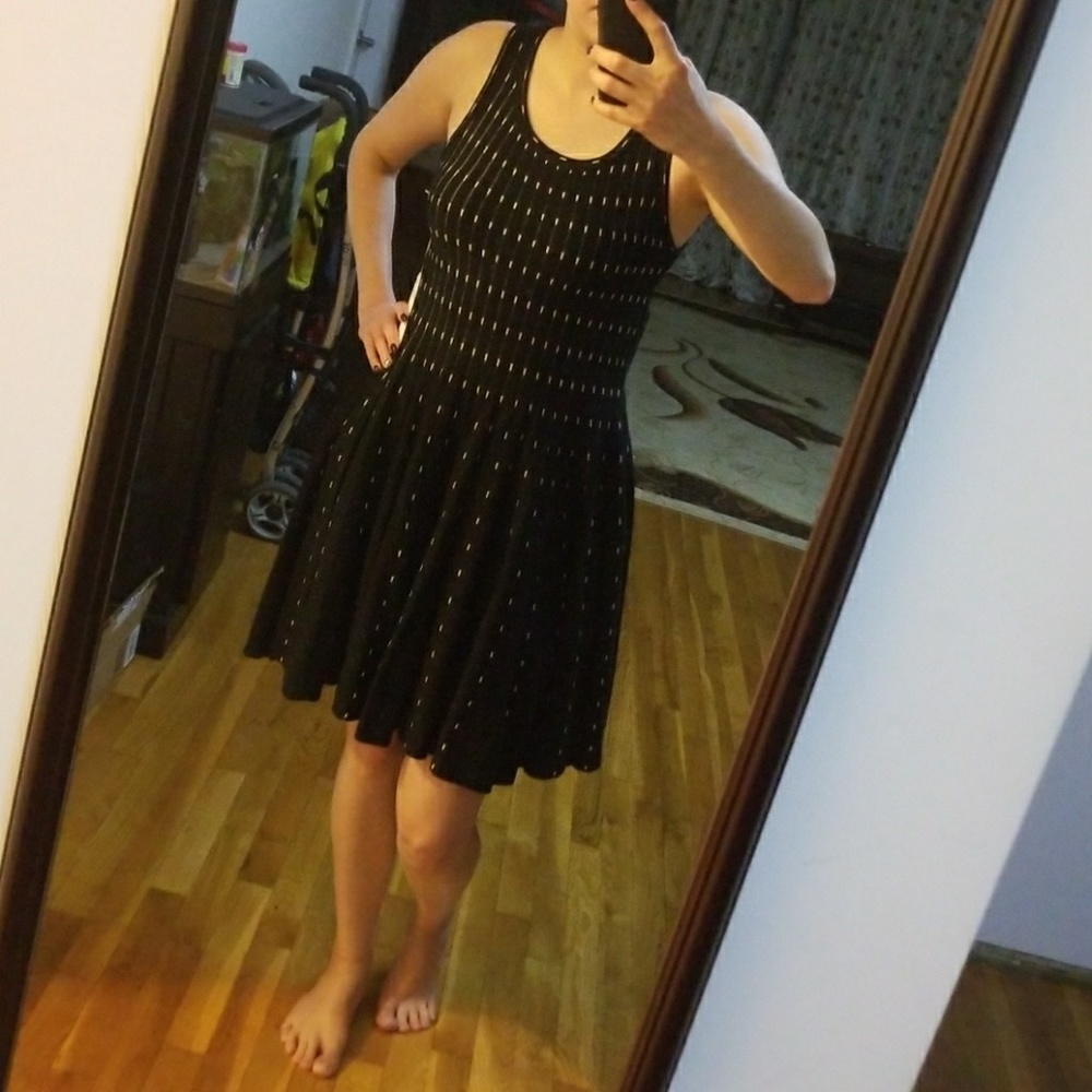 NWT black flirty sweater dress.