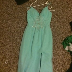 Long teal sequined prom gown