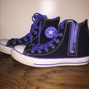 Black and blue converse high tops