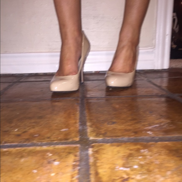 Steve Madden heels , scuffed on the back .