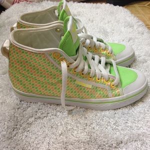 Neon green and yellow high top adidas