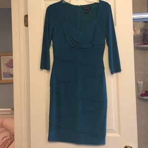 Slimming back zip dress