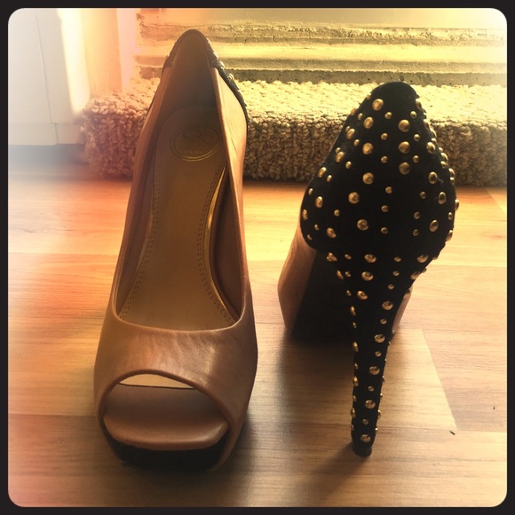 Peep toe heels with black suede/gold backs.