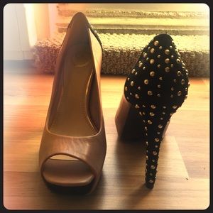 Peep toe heels with black suede/gold backs.