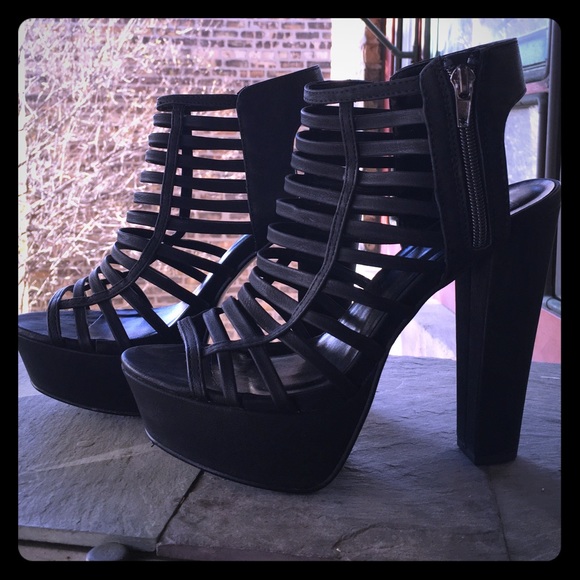 Black, sexy heels size 9. Never worn!