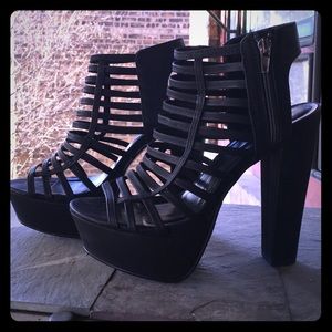 Black, sexy heels size 9. Never worn!