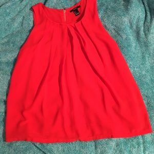 orange flowy tank top