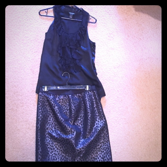 Sleeveless silk top with animal print skirt