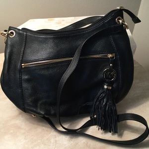 Michael Kors black tassel bag. Unused.