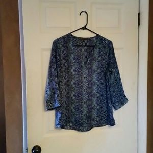 Limited. Peacock colored silky v neck shirt