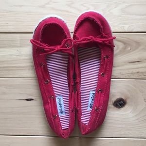 Red slip on sandals