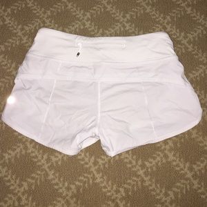 Lululemon running shorts with backside zipper.