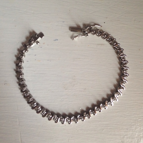 Silver and very tiny diamond bracelet