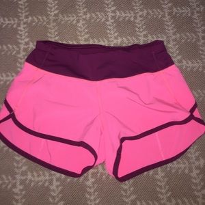 Lululemon running shorts with backside zipper.