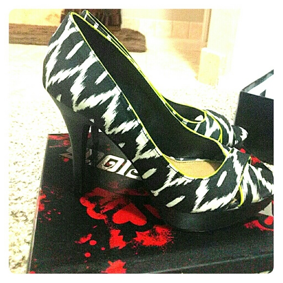 Fergalicious black and white pumps
