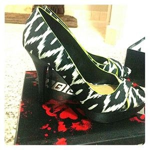 Fergalicious black and white pumps