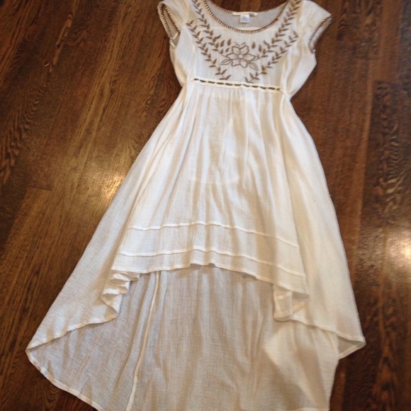 White linen dress with brown floral detail
