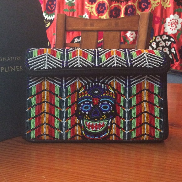 Donald J. Pliner Handbags - Funky/Folksy Donald J. Pliner hand beaded clutch.
