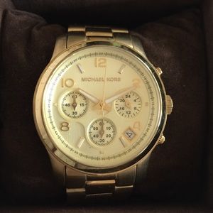 Gold women's Michael Kors watch