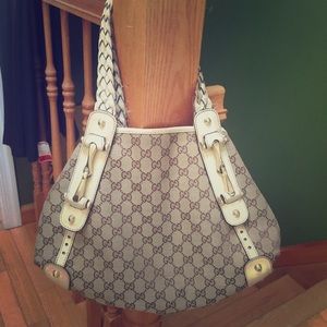 Used authentic Gucci purse with braided handle