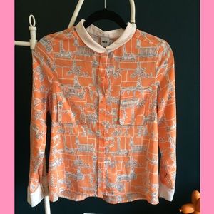 Orange blouse with unique pattern
