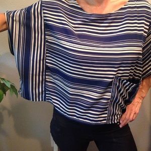 Blue and white trapeze top