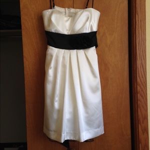 Cute black and ivory dress with flower accent