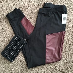 Black leggings with maroon faux leather colorblock