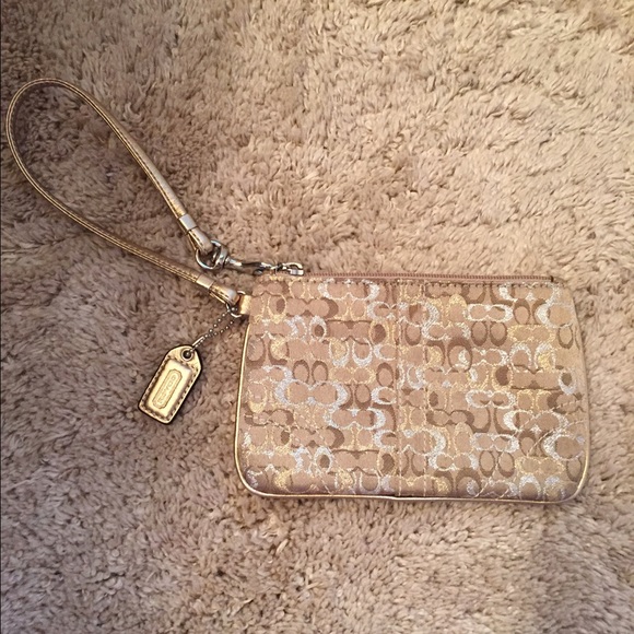 Coach gold and silver wristlet