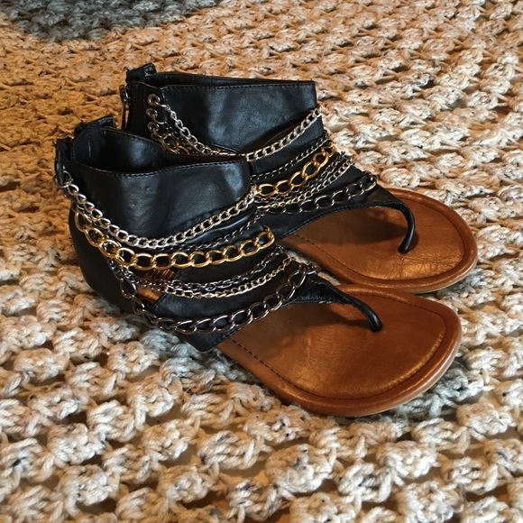 Black sandals with chain detail