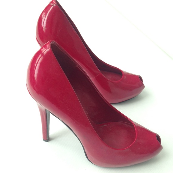 Red Jessica Simpson pumps.