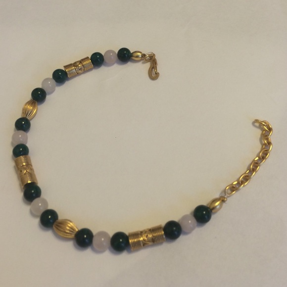 Bracelet with gold hardware and jade colored beads