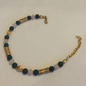 Bracelet with gold hardware and jade colored beads