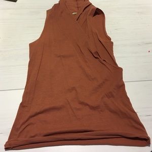 Sleeveless burnt orange crossover top