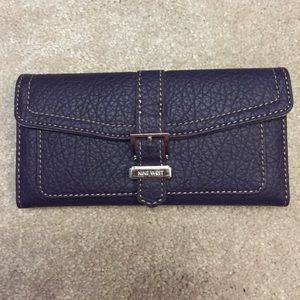 Barely used purple Nine West wallet