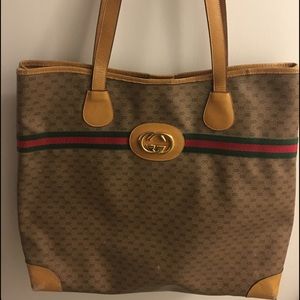 Auth. Vintage Gucci Tote with a golden medallion