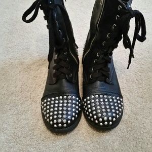 Studded boots.
