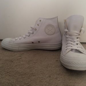 All White Leather High-Top Converse.