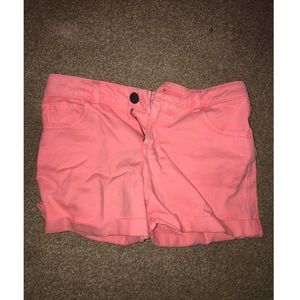 Neon pink slightly high waisted shorts