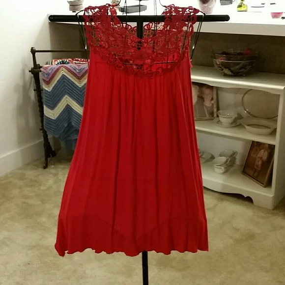 Very pretty red top, with lace trim at the neck