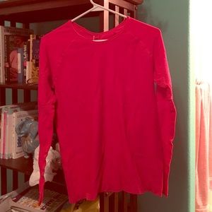 Long sleeve stretch workout shirt with mesh detail