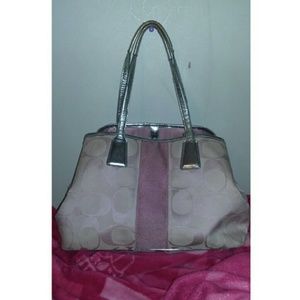 Large kisslock coach purse.