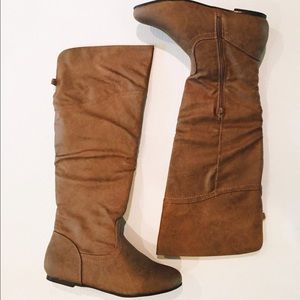 Flat brown knee high boots