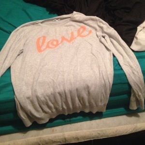 Long sleeve grey shirt.