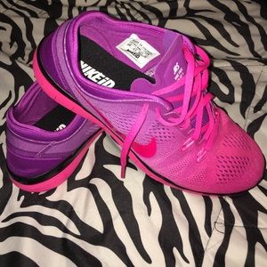 Purple/pink nike 5.0 free runs